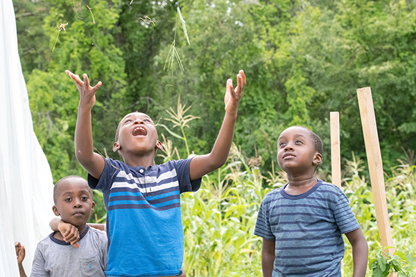 Refugee children on the Fresh Start Farm